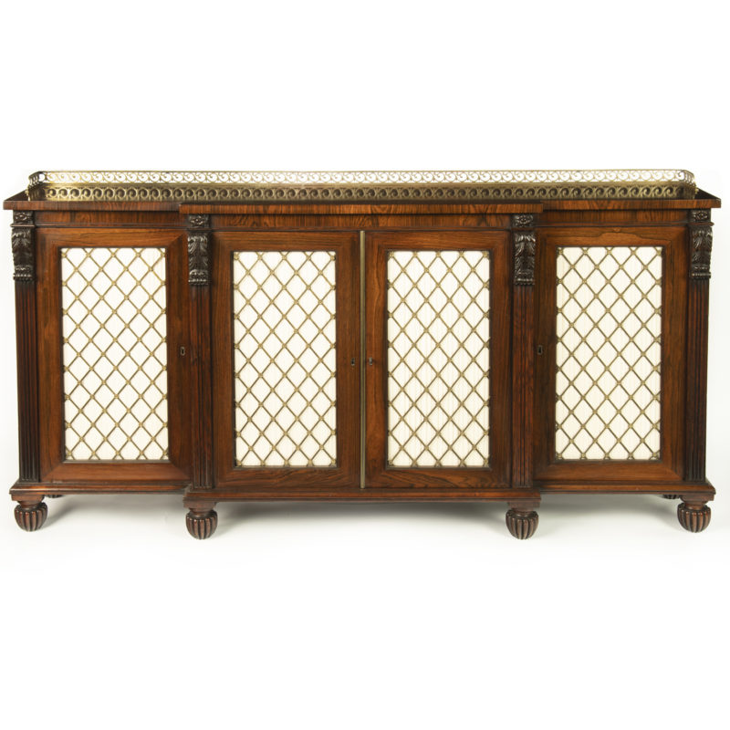 A late Regency rosewood breakfront four door side cabinet, attributed to Gillows