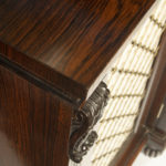 A late Regency rosewood breakfront four door side cabinet, attributed to Gillows corner