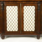 A late Regency rosewood breakfront four door side cabinet detail silk