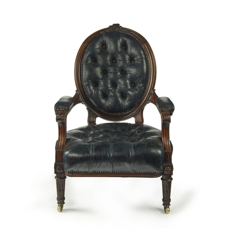 A Victorian rosewood medallion backed open arm chair by Holland & Sons main