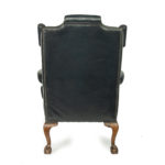 A generous late Victorian walnut wing arm chair, in the Georgian style back