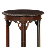 A pair of mahogany circular occasional tables detail