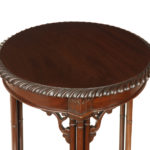 A pair of mahogany circular occasional tables detail
