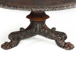 A large George IV brass inlaid rosewood centre table attributed to Gillows base
