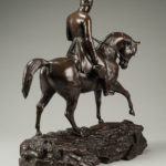 This bronze statuette shows Arthur Wellesley, Duke of Wellington riding his warhorse Copenhagen. side