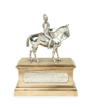 A Victorian silver and bronze equestrian military statuette of the 'Somerset Challenge Trophy', John Aldwinckle & James Slater, London 1891.