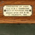An oak tray from H.M.S. Cambridge plaque