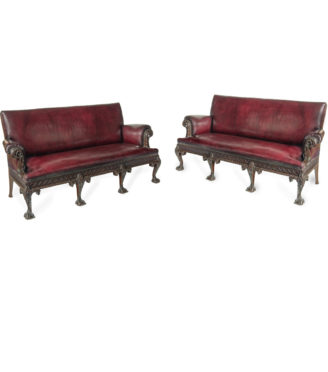 A fine pair of large late Victorian mahogany eagle sofas