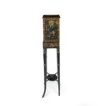 A delicate Regency Chinoiserie lacquer cabinet detail side