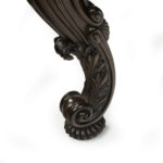 A large late Regency mahogany partner’s library table details leg