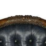 A Victorian blue leather oak library chair details