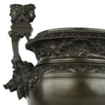 A pair of Belgian bronze urns by Luppens details handle