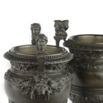 A pair of Belgian bronze urns by Luppens