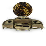 An Art Deco silver mounted tortoiseshell necessaire de toilette