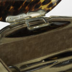 An Art Deco silver mounted tortoiseshell necessaire de toilette detail