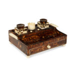 A Regency tortoiseshell and ivory desk set,