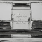A George V silver double inkstand presented to Major Seymour Egerton, Coldstream Guards, by Prince Arthur Duke of Connaught & Strathearn, of rectangular form with two pen trays and two square inkwells with glass bottles, inscribed between the wells ‘Josslyn Seymour Egerton, Coldstream Guards on his marriage, from Arthur Duke of Connaught & Strathearn, June 23rd 1913’, one inkwell collar missing, hallmarked for D and J Wellby