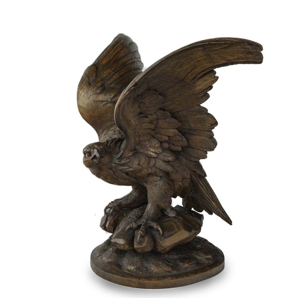 A large Black Forest walnut wooden carving of an eagle main