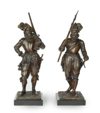 A pair of bronze standing figures of Conquistadors,