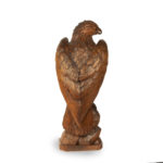 A large Black Forest linden wooden carving of an eagle back