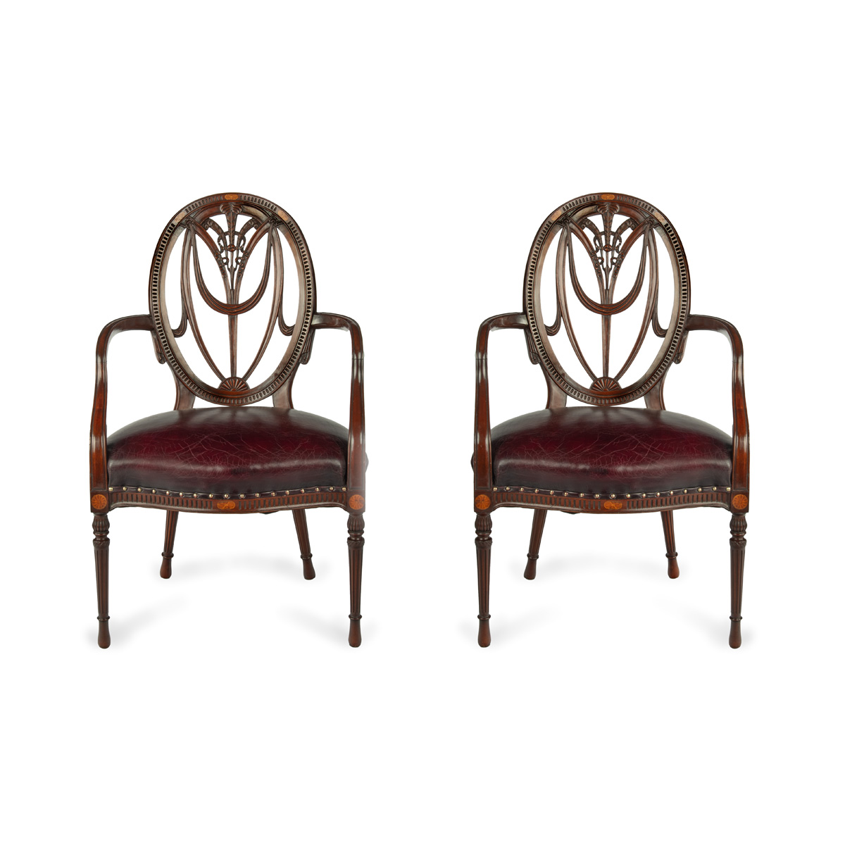 A pair mahogany Hepplewhite style arm chairs,