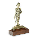 An Admiral Lord Nelson commemorative solid brass doorstop side