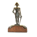 An Admiral Lord Nelson commemorative solid brass doorstop back