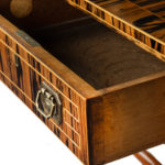 A striking Regency coromandel sofa table drawer detail