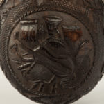 A sailor’s carved coconut Bugbear powder flask details