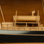 A Scottish builder's cased half hull model of a herring drifter close ship detail