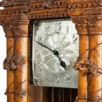 A ‘Black Forest’ linden wood long case clock by Spring of Interlaken clock details