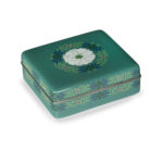 A small Meiji period cloisonné box and cover with a floral roundel by Tabako,