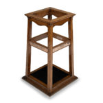 A Foudroyant oak and copper umbrella stand by Goodall, Lamb & Heighway, Manchester