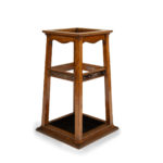 A Foudroyant oak and copper umbrella stand by Goodall, Lamb & Heighway