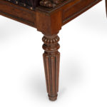 A large and fine rosewood Regency armchair leg