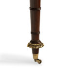 A Regency ormolu mounted rosewood two drawer writing table detail leg
