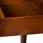 A Regency ormolu mounted rosewood table drawer detailing