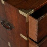 A small brass-bound teak campaign chest in two parts drawer side details