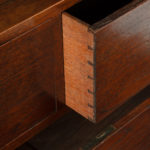 A small brass-bound teak campaign chest in two parts drawer details