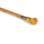 An early whaler's dress cane with a clenched fist