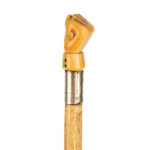An early whaler's dress cane with a clenched fist side