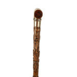 finely carved fruitwood cane with royal and masonic symbols handle