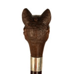 A novelty snakewood cane with a cat’s head back