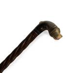 A late Victorian cane with a smiling dog’s head