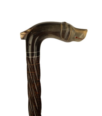 A late Victorian cane with a smiling dog’s head side