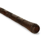 A cleverly carved mahogany walking cane top