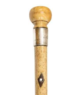The plain whalebone cane of J Godden, dated 1896,