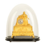 An ormolu mantel clock with Queen Victoria in medieval dress, by Monroux, 1832 - cased