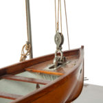 A working model of a ship’s personnel lifeboat on davits detail