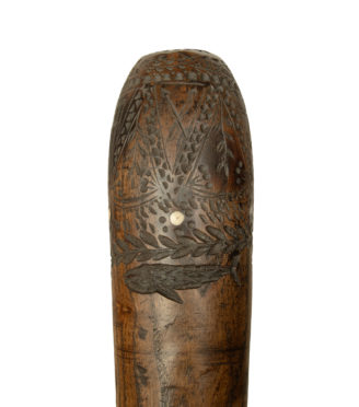 An Anglo-American whaler fid set with a Tudor coin and carved with the Stars and Stripes